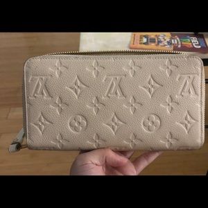 Louis Vuitton empreinte secret long wallet